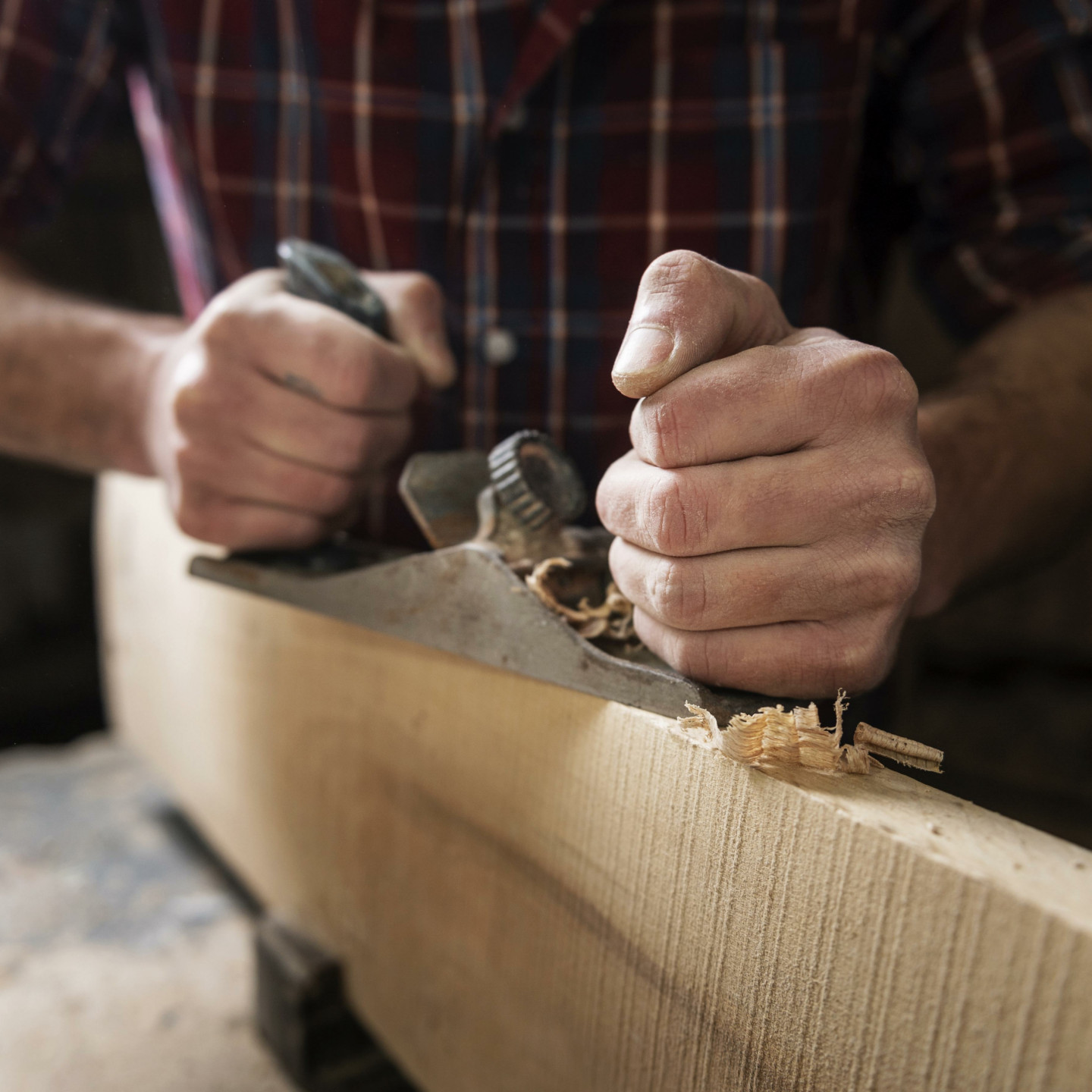 man-working-with-wood-workshop